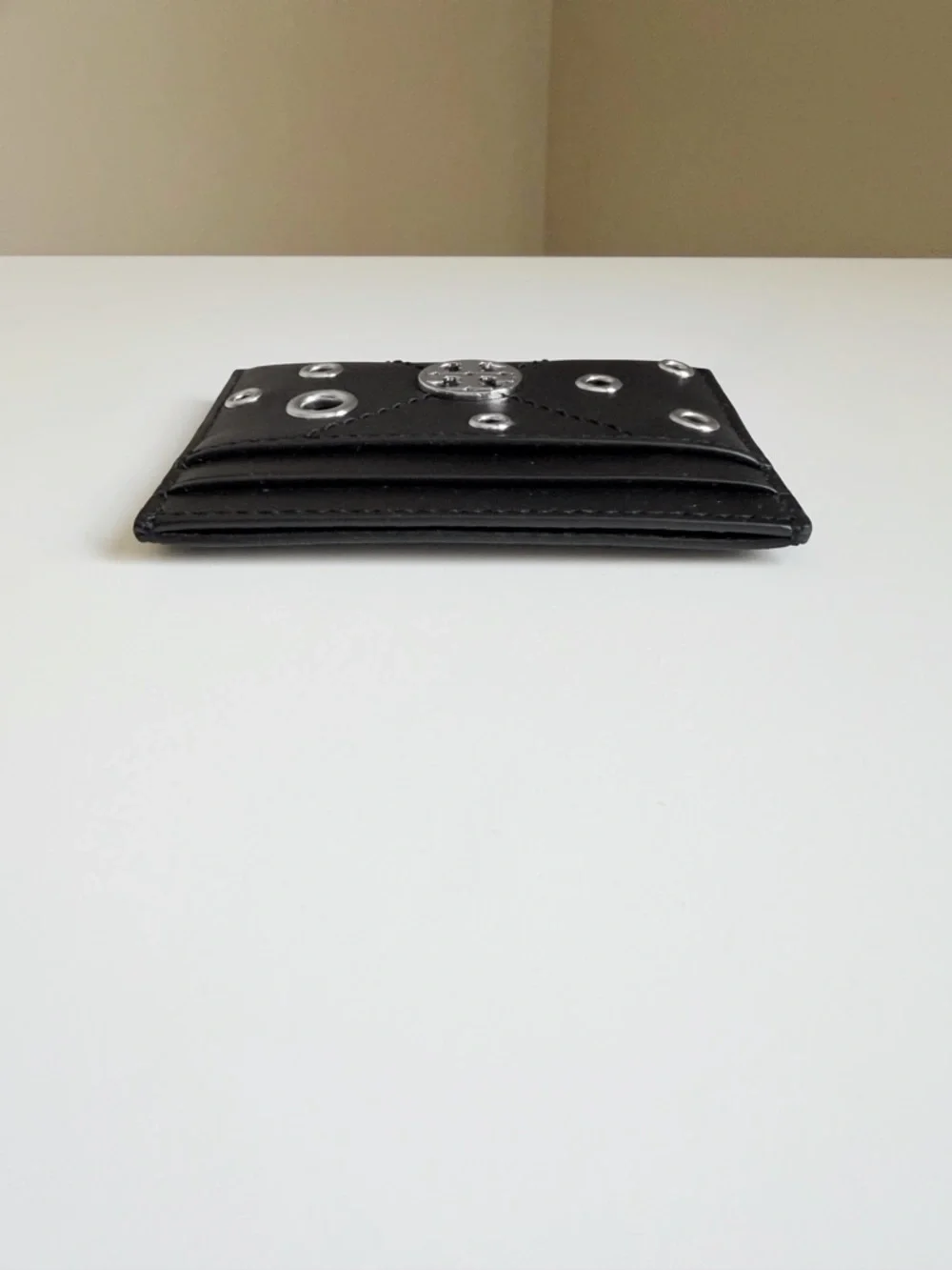 Tory Burch Black Leather Grommet Card Holder with Silver Logo